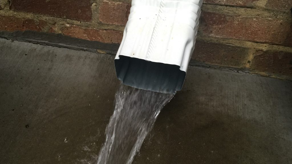 Downspout test with gutter cleaning service