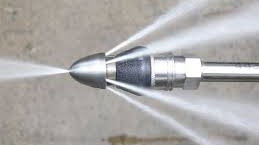 Water jetting tip for power washing